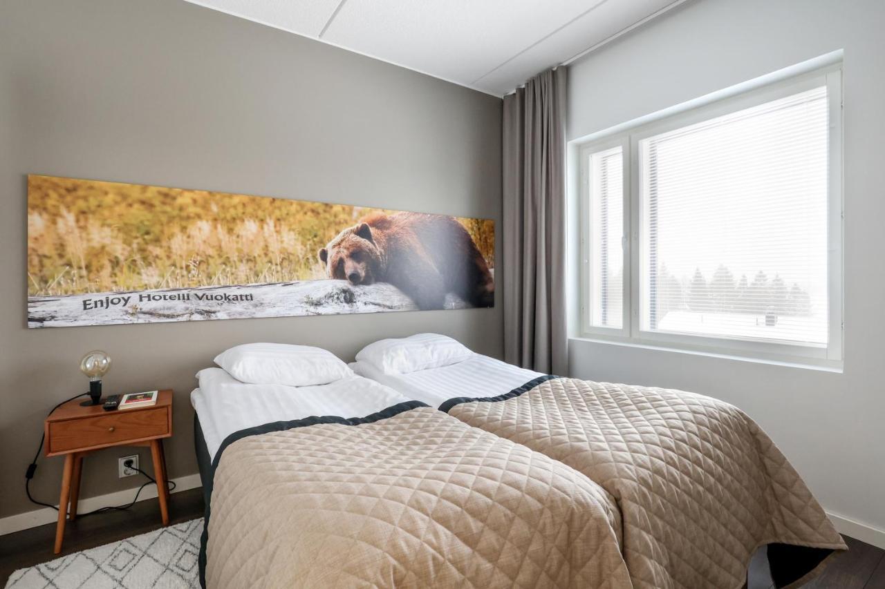 Aateli Lakeside Chalets - Former Vuokatti Suites Extérieur photo